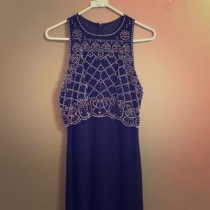 A navy blue floor length prom/formal dress size 8